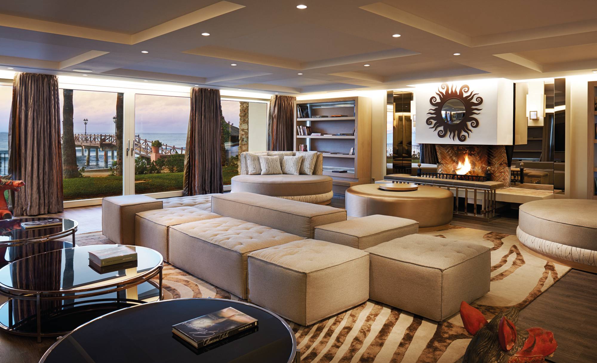Marbella Club Villa del Mar - Basement Livingroom fireplace