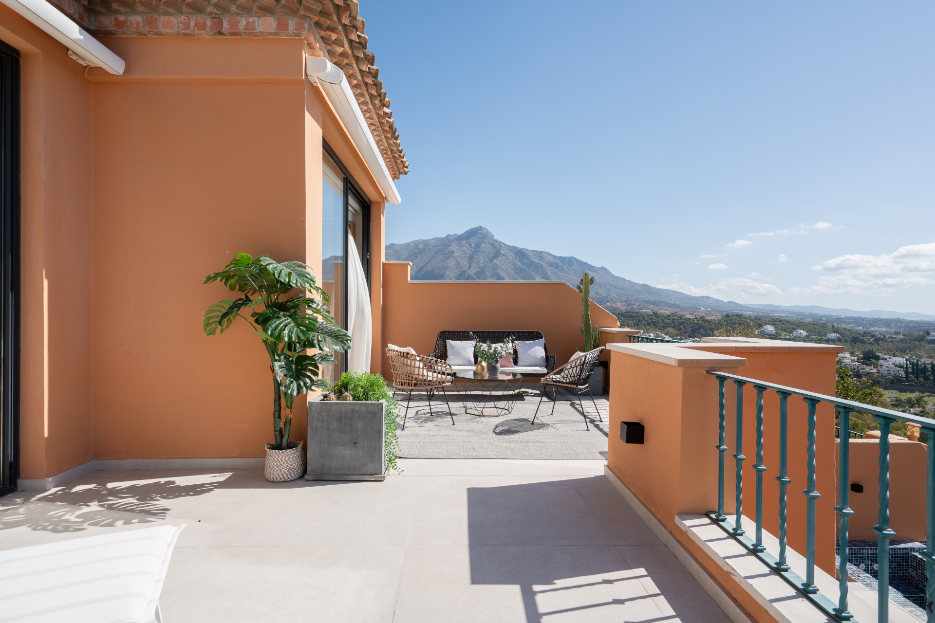 Private terrace of the Les Belvederes duplex penthouse looking towards La Concha mountain