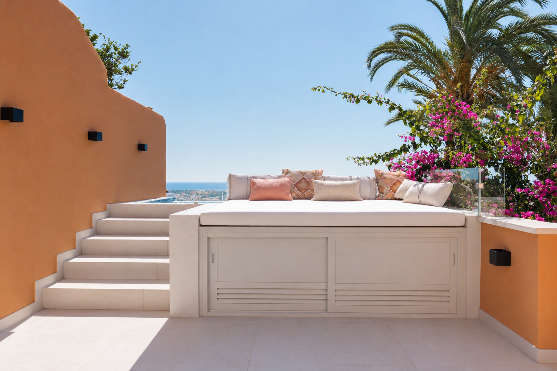 Private plunge pool and sun terrace with bougainvillea and sea views