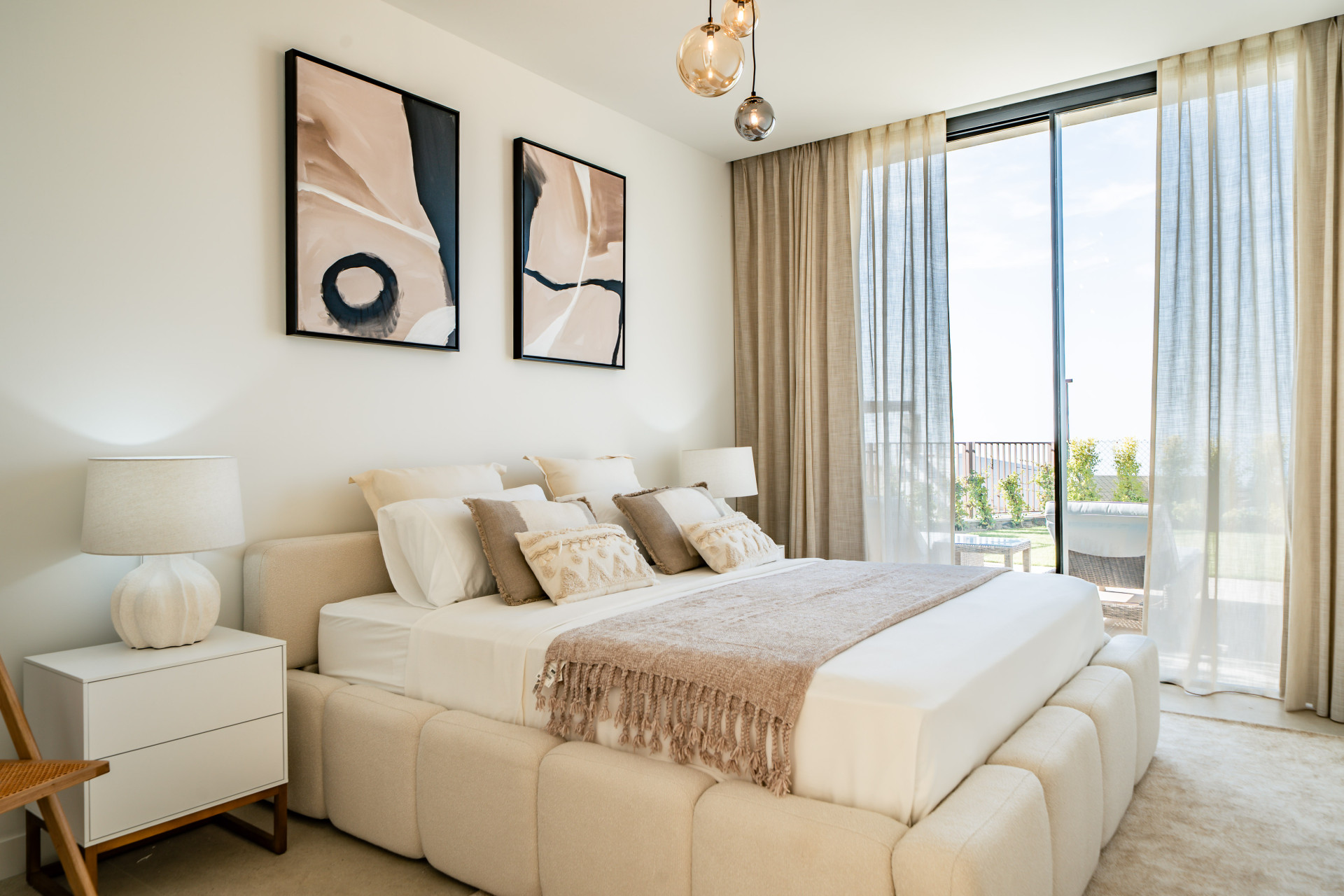 Principal bedroom at Villa Romero with glazed doors opening towards the terrace